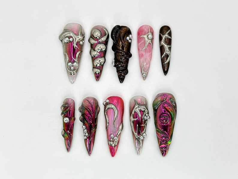 Gothic Metallic Stiletto Nails | Futuristic Metallic and Pink Nails with 3D Designs | Art Deco-Inspired Chrome | 3D Silver Details |JB600HK