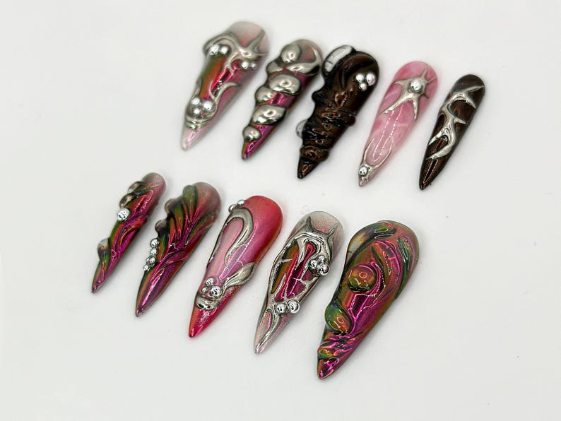 Gothic Metallic Stiletto Nails | Futuristic Metallic and Pink Nails with 3D Designs | Art Deco-Inspired Chrome | 3D Silver Details |JB600HK