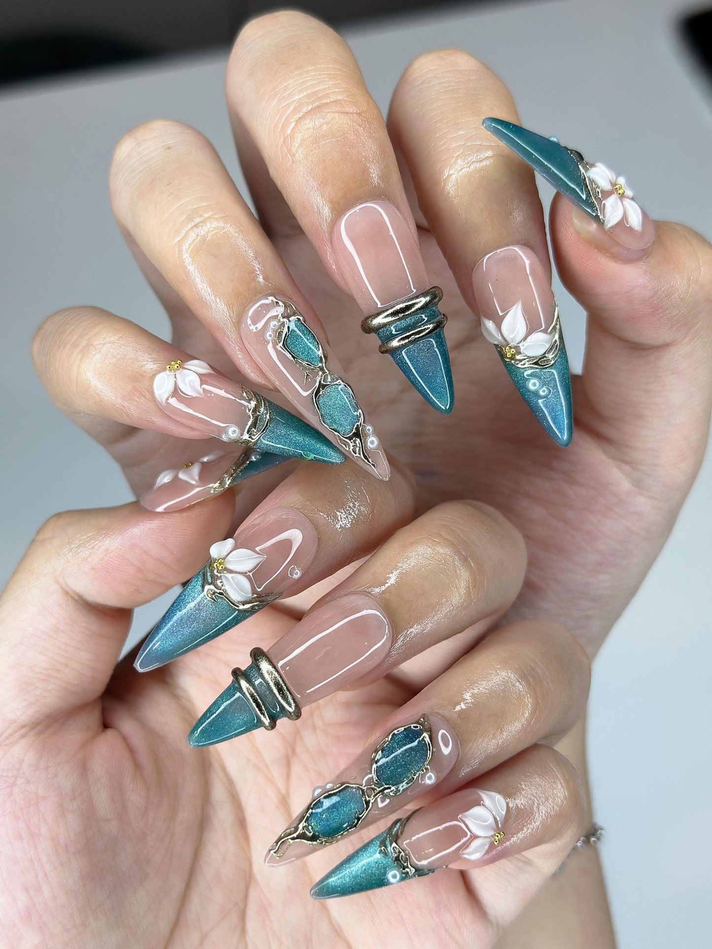 Teal Cat-Eye & 3D White Bloom Nails | Antique Gold Chrome Accents | Luxury Botanical Magnetic Stiletto Art | Elegant Nails | JB379IK