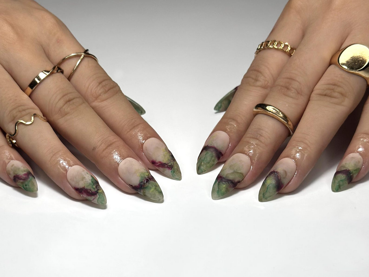 Maroon Nails with Flowing Marble Veins