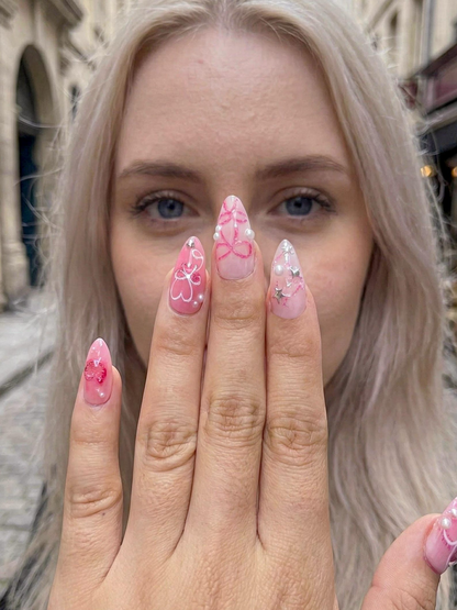 Press On Nails with Pink Ribbon & Heart Charm Design, Handmade Long Glossy Fake Nails for Romantic Coquette Look or Aesthetic Statement Nails