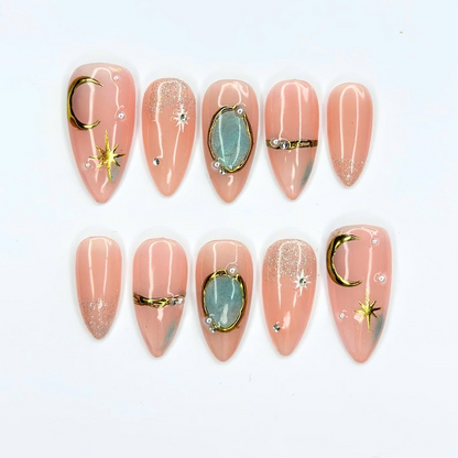 Celestial Press On Nails with Gemstone Charm | Nude Crystal Fake Nails in Almond Shape | Handmade Star Nail Art for Women | OB515UA