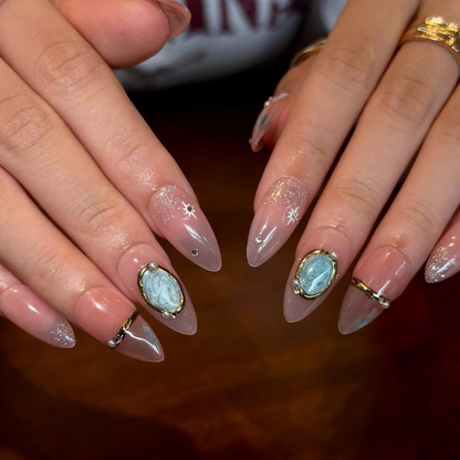Celestial Press On Nails with Gemstone Charm | Nude Crystal Fake Nails in Almond Shape | Handmade Star Nail Art for Women | OB515UA