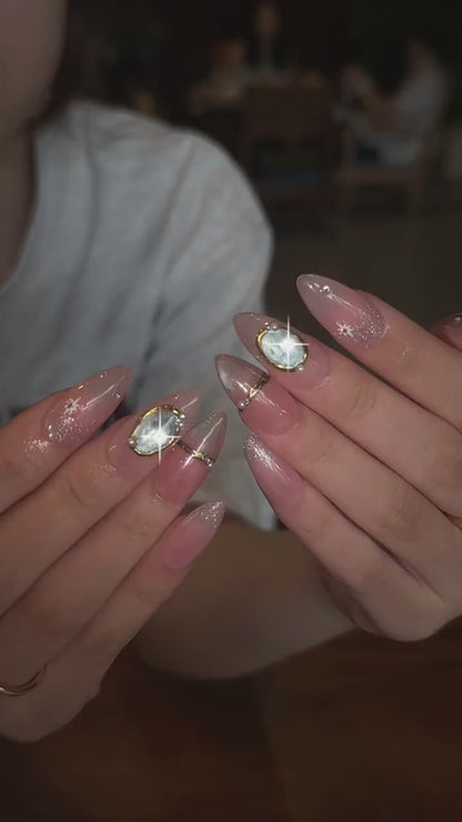 Celestial Press On Nails with Gemstone Charm | Nude Crystal Fake Nails in Almond Shape | Handmade Star Nail Art for Women | OB515UA
